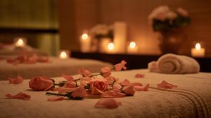 Therapist applying focused pressure on a client’s muscle knots during trigger point therapy